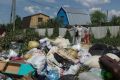 Шокирующий штраф: владелица дачи заплатила 300 000 рублей за свалку, устроенную соседями